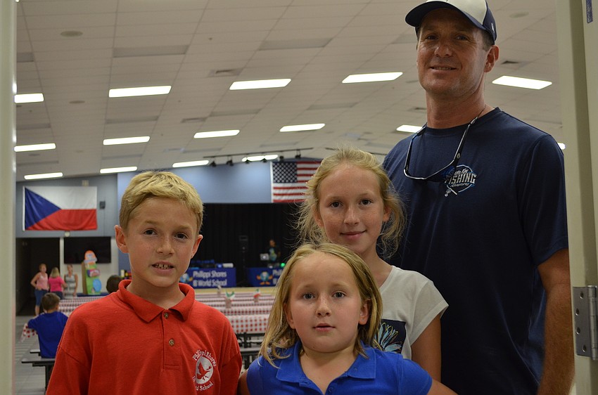 Eric Clayton with Andrew, Ava and Keeley.