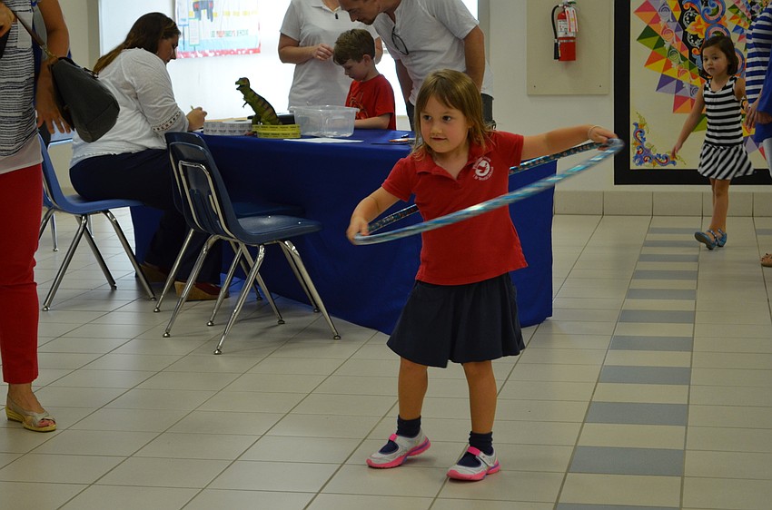 Finnley Jones prepares to spin her hula hoop.