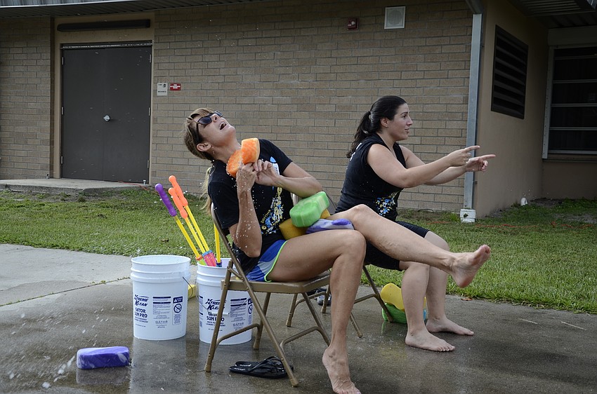 Principal Hayley Rio gets whacked by a sponge.