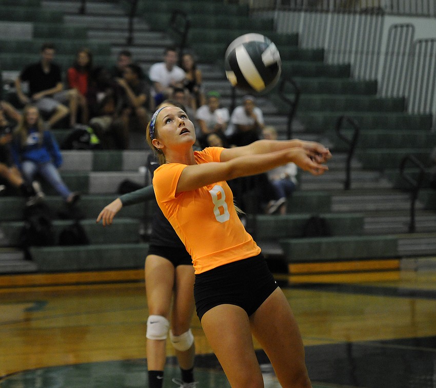 Lakewood Ranch libero Ande McDonald passes the ball back up to a teammate.