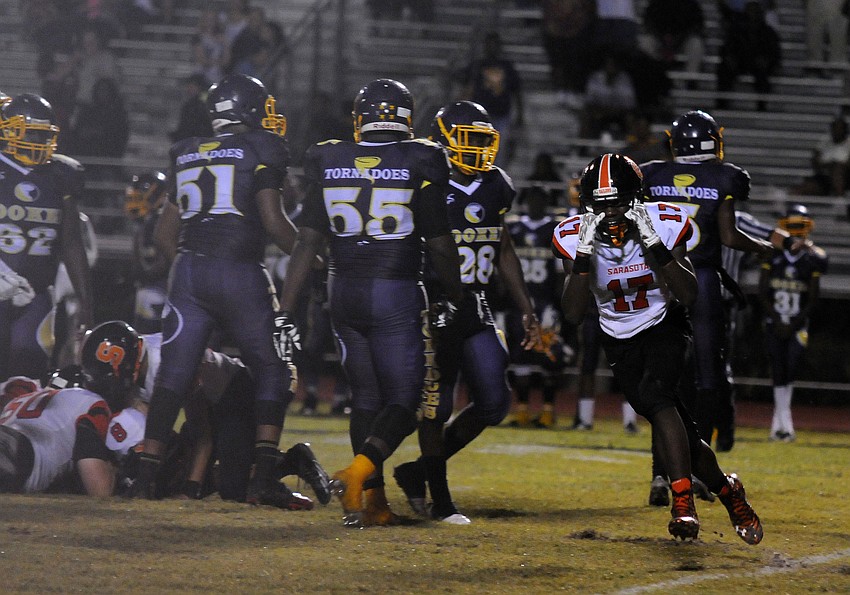 Sarasota linebacker Dekota Morris celebrates following a Booker fumble.