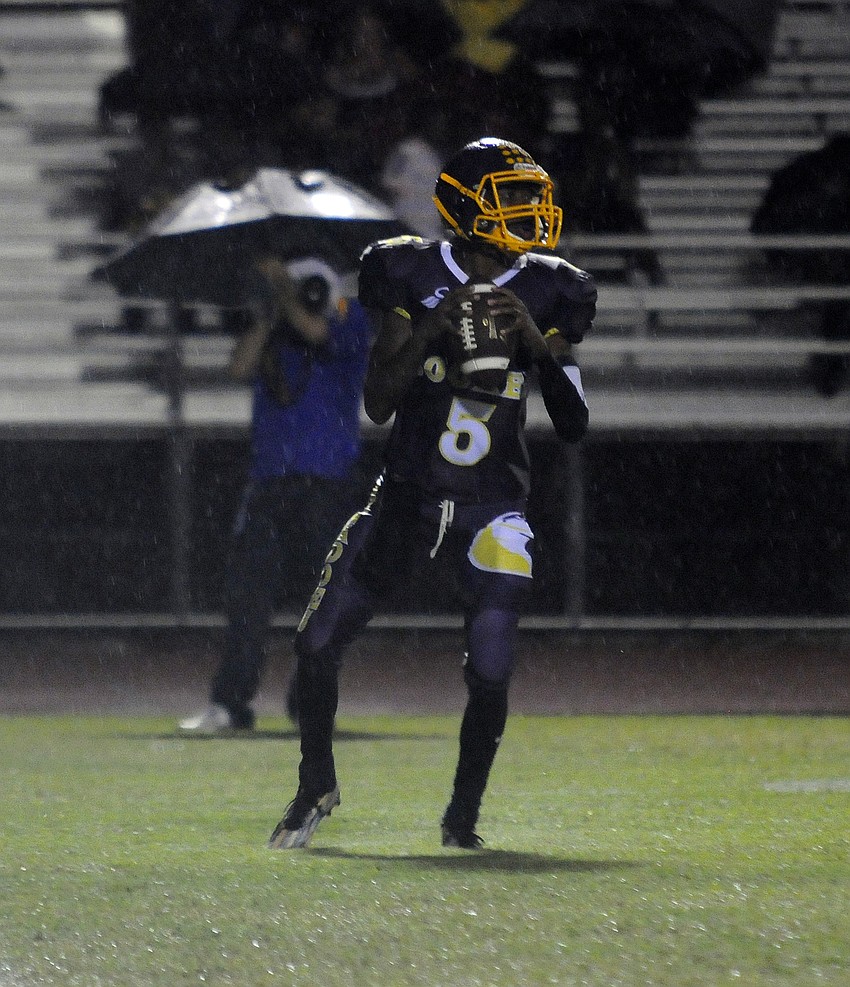 Booker quarterback Arthur Brantley drops back for a pass in the second quarter.