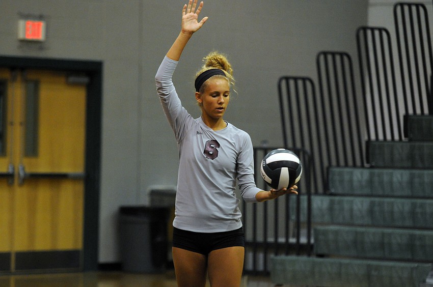 Freshman outside hitter Alex Hilton prepares to serve the ball against Lakewood Ranch.