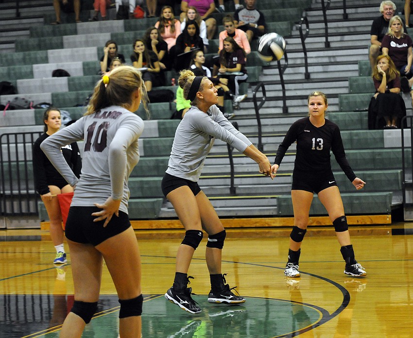 Riverview freshman Alex Hilton passes the ball to a teammate in the first set.