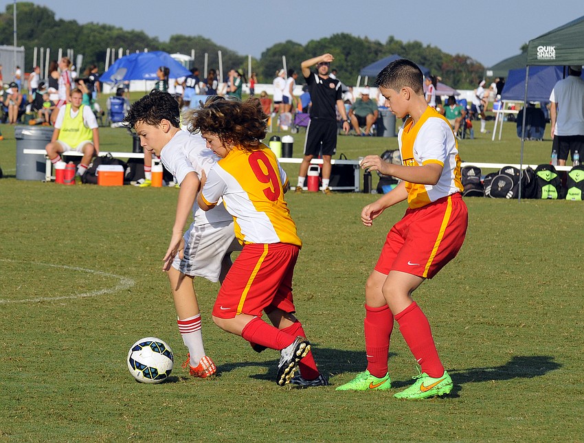 Lakewood Ranch Chargers defender Victor Vandenbroek fights for the ball during the Lakewood Ranch Chargers game versus Clay County.