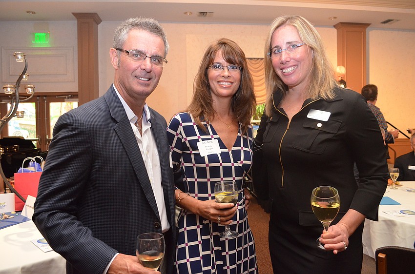 Dr. Kelvin and Margie Cooper with Jennifer Rominiecki