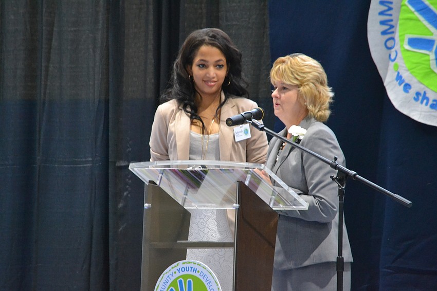 Setierah Preston and Lisa Carlton of Mabry Carlton Ranch welcome guests to the 2015 CYD Leadership Breakfast.