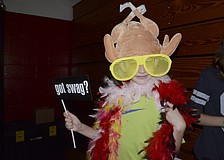 Kyle Davenport shows off his eccentric costume for the photo booth.