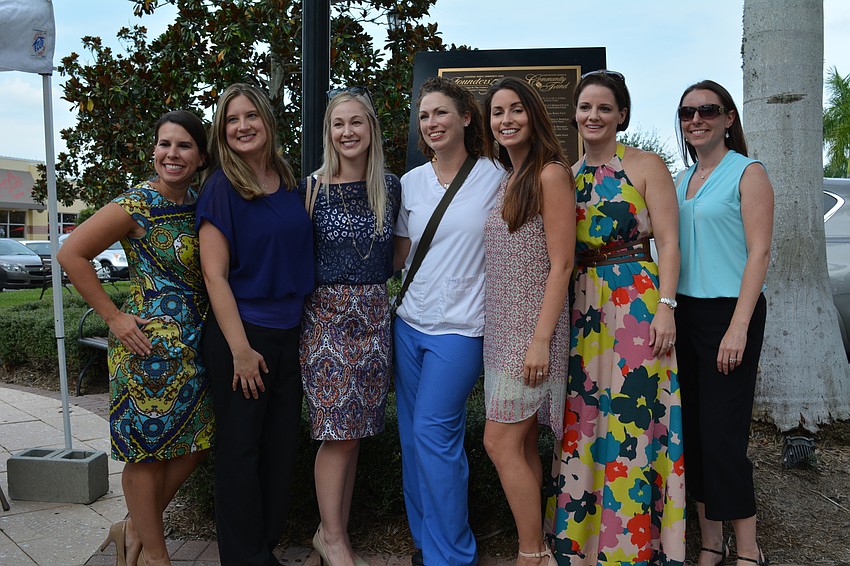 Members of the Cheers for Charity Women's Giving Circle Fund pose for a picture.