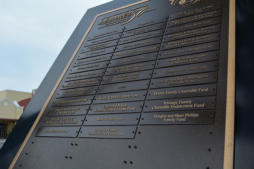 The Lakewood Ranch Community Fund added four name markers to its monument on Lakewood Ranch Main Street.