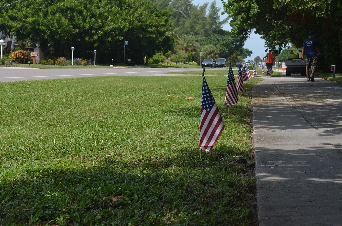 The Longboat Key Public Works Department puts 2,974 flags along Gulf of Mexico Drive to commemorate the 2,974 lives lost on Sept. 11, 2001.