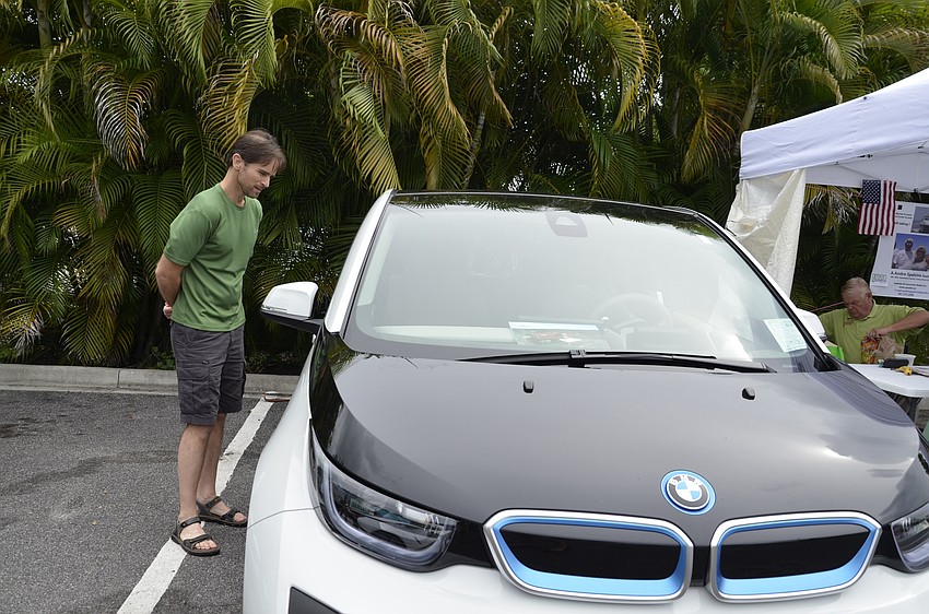 Colin Derek checks out a hybrid BMW.