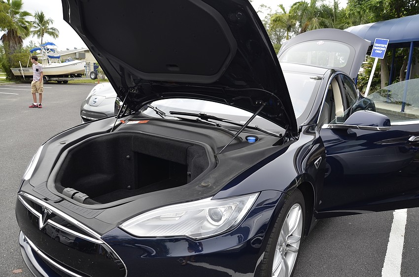 This Tesla Model S has extra storage space under the hood — the engine is located in the rear of the vehicle.