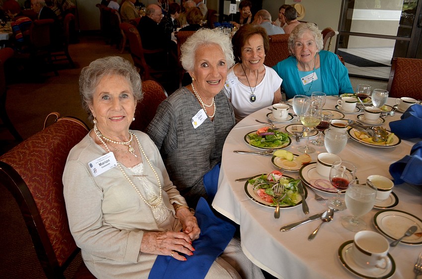 Marion Goldsmith, Diane Milrod, Joan Halpern and Susan Skovronek enjoy cold salads and drinks.