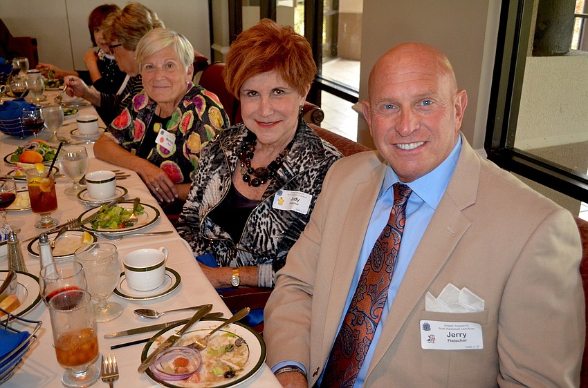 Marlene Meyer says cheese with friends Judy and Jerry Fleischer.