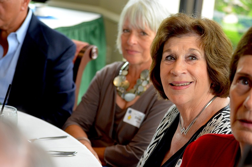 Alice Shwon enjoys time with friends and fellow parishioners.