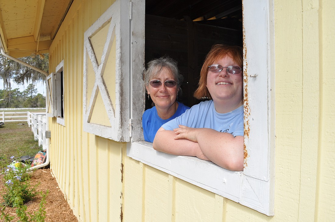 Longtime Sarasota-Manatee Association of Riding Therapy leader Gail Clifton, left, is again serving as the organization's interim volunteer executive director.