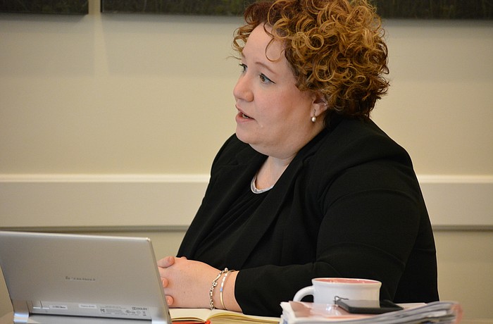 Town Hall Executive Director Eva Rey leads a discussion on finding her replacement. File photo.