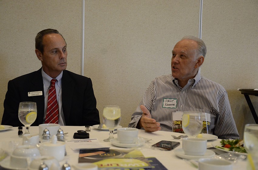 Frank Verdel, community specialist with Lakewood Ranch, listens to Steve Vernon, District 73 state representative candidate, during the 