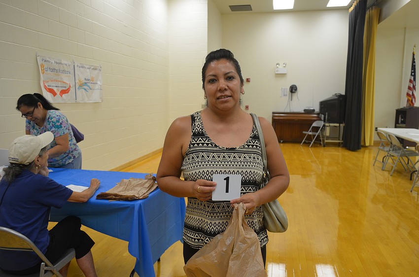 Martha Rodriguez, who is first in line at every Tuttle food bank.