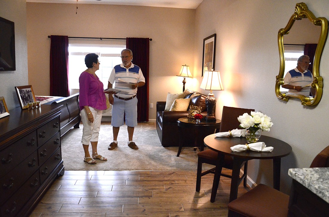 Annette and Bob Ducatelli check out the alcove apartment, which is bigger than a studio and smaller than the one-bedroom layout.
