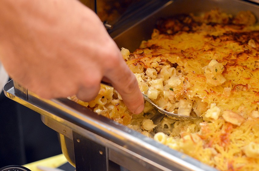 Blue Rooster’s oven baked macaroni and cheese with white cheddar and smoked Gouda cheese