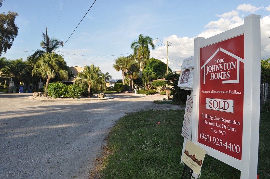 Throughout the Bay Island neighborhood, construction on new homes serves as evidence of  the increased residential sales in the area.