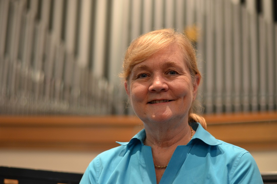 Mary Mozelle was promoted to the position of music director for St. Boniface Episcopal Church.