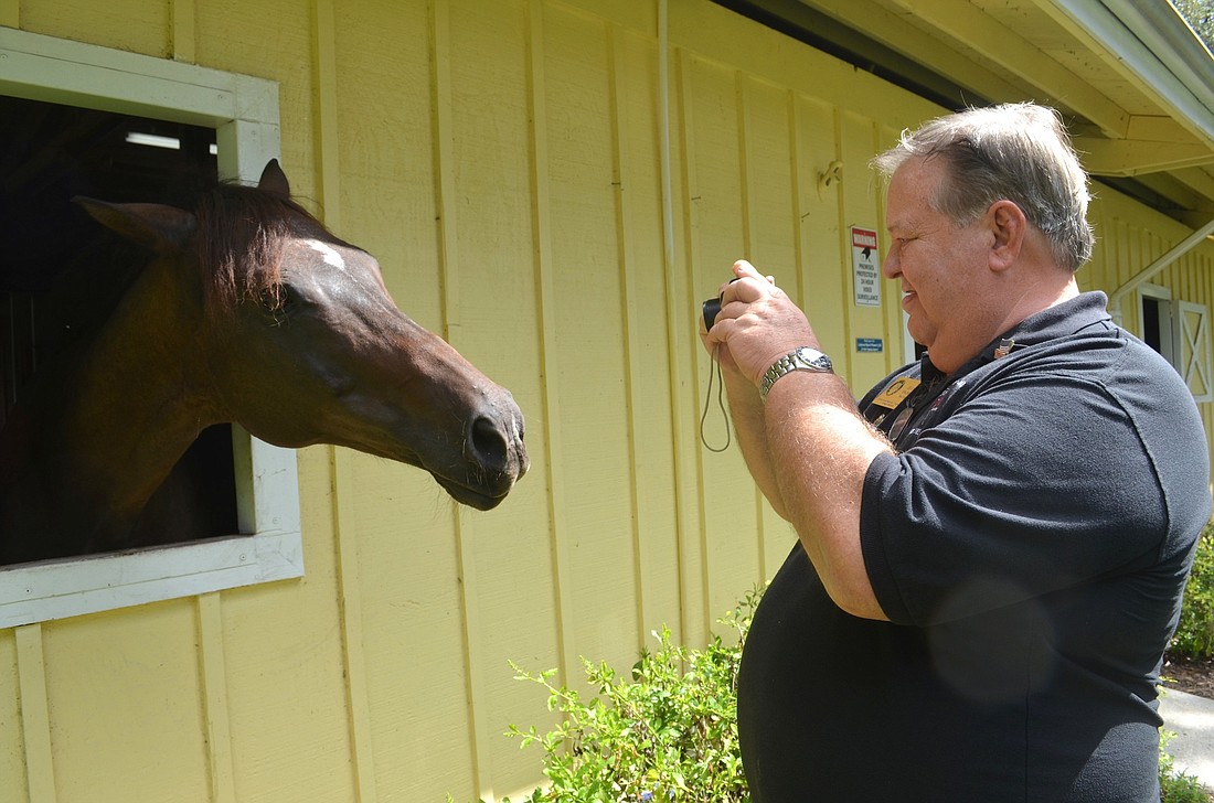 Lakewood Ranch-Sarasota Elks Lodge Trustee Jack Ogren makes a new friend.