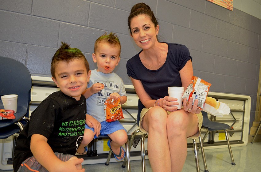 Donovin DeStefano enjoys game night with his brother, Dawson, and mother, Andrea.