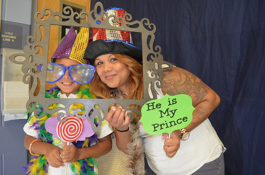 Robert and Natasha Bauer show off with costumes and props.