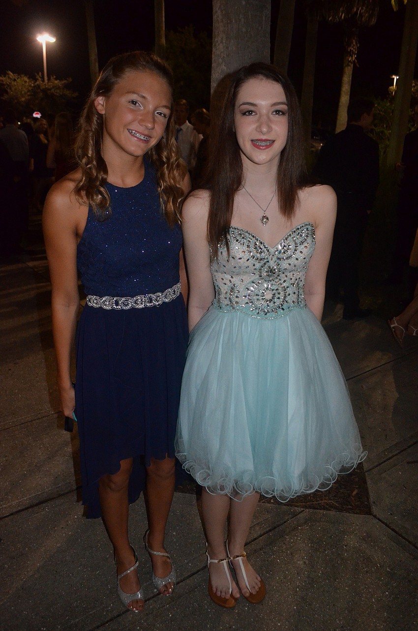 Isabella Yost and Katherine Minton show off their formal dresses.
