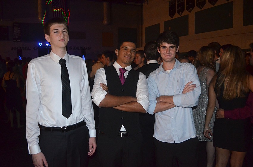 Caleb Duke, Donovan Thomas and Nick Jacobs  show off their formal wear.