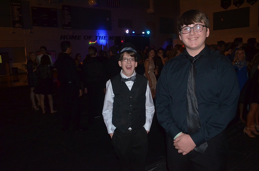 Quentin Waid and Matt Marsh look for their friends on the dance floor.
