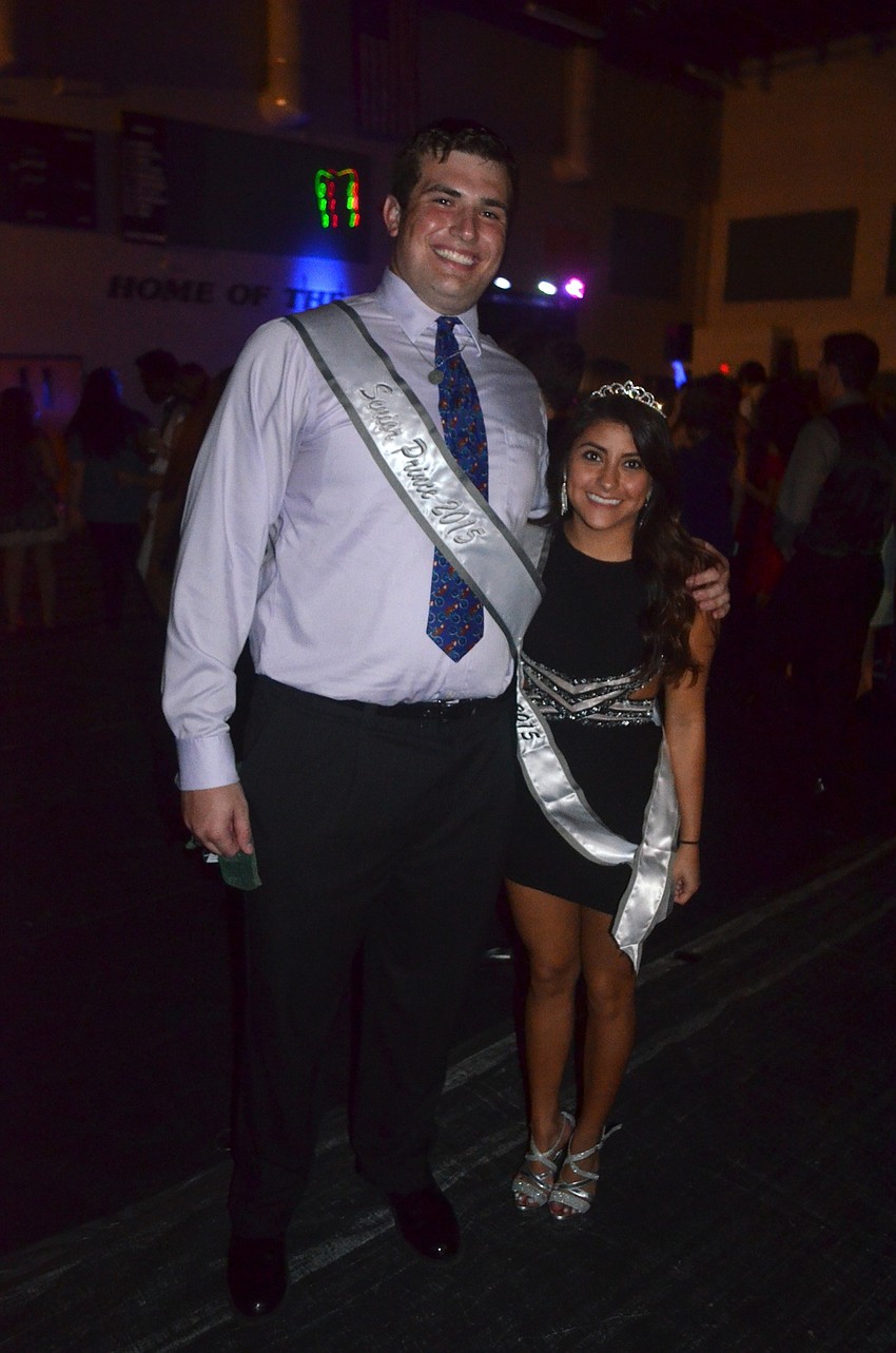 Senior Prince Gabriel Overmyer shares a moment and smile with Senior Princess Claudia Sarria.