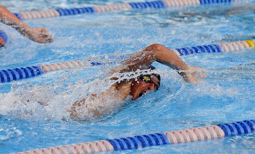 Sarasota's Graham Devitt competes in the 200-yard freestyle.