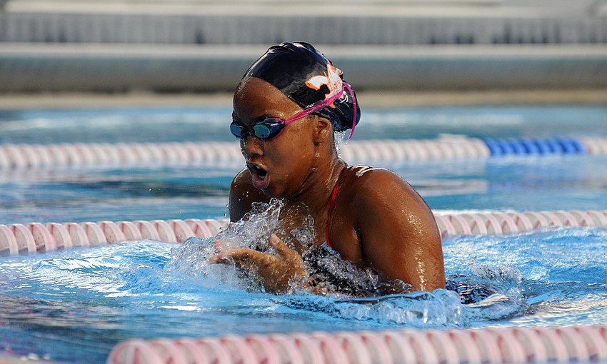 Gabrielle Kow swims the breaststroke during the 200-yard individual medley.