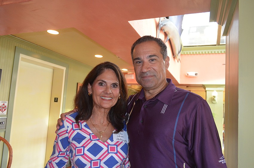 Photographer Mary Lou Johnson, and Jeff Mayers, of the Longboat Key Club