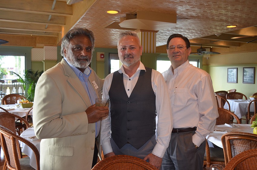 Shammi Talreja, of Mutual of Omaha, with Jeff Merckle and Jesse Cook, of RVA