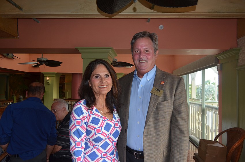Photographer Mary Lou Johnson and Michael Doll, of Longboat Key Financial Group