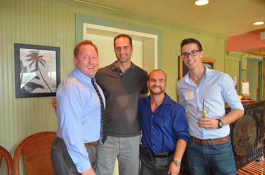 Bob Dinan, of Dinan Realty Group, Matt Bruback, of Miracle at Suncoast, Cliff Kranenburg, of Kranenburg Painting and Jonathan Da Sois, of YT Group