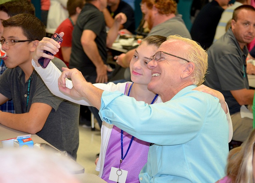 Ashley and Mitch Teitelbaum take a photo of themselves to remember the moment.