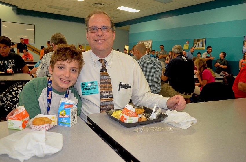 Casey Cusick starts his school day with his father, Robert.
