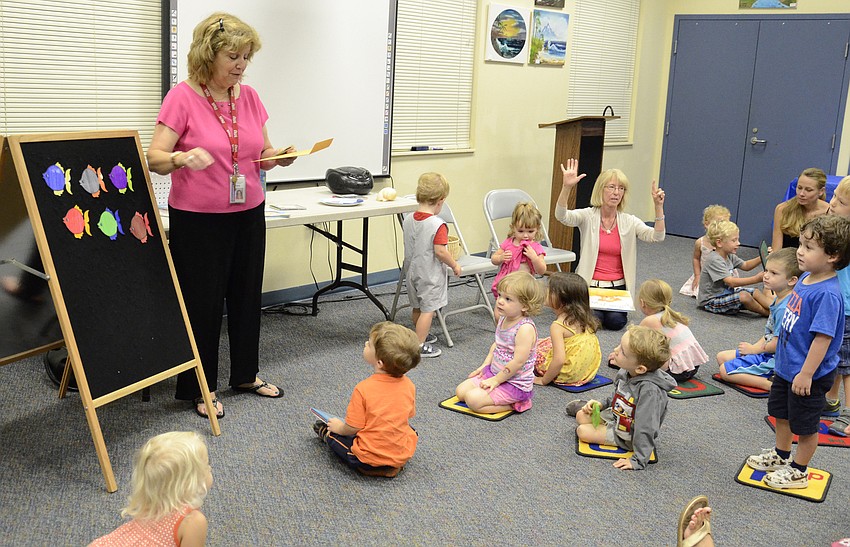 Chris Culp leads a counting song with some countable fish.