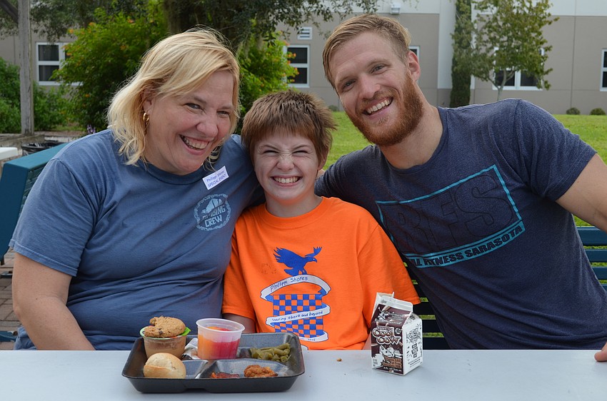 Barb Torrance with her sons Cody and Dr. Ron Torrance.