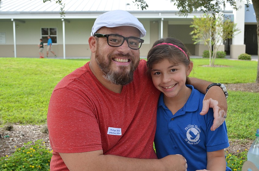 Casey Casal brought lunch for his daughter Selah at Phillippi Shores Elementary School.