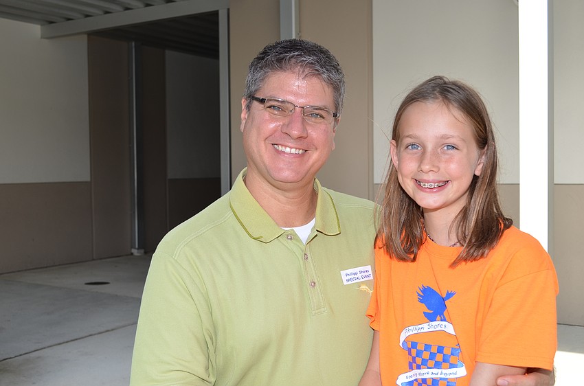 Dennis Nemeth brought lunch in for his stepdaughter Grace Hollinger.