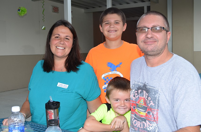 The entire Hackett family of Jackie, Cameron, Conner and Brad ate lunch in the courtyard today.