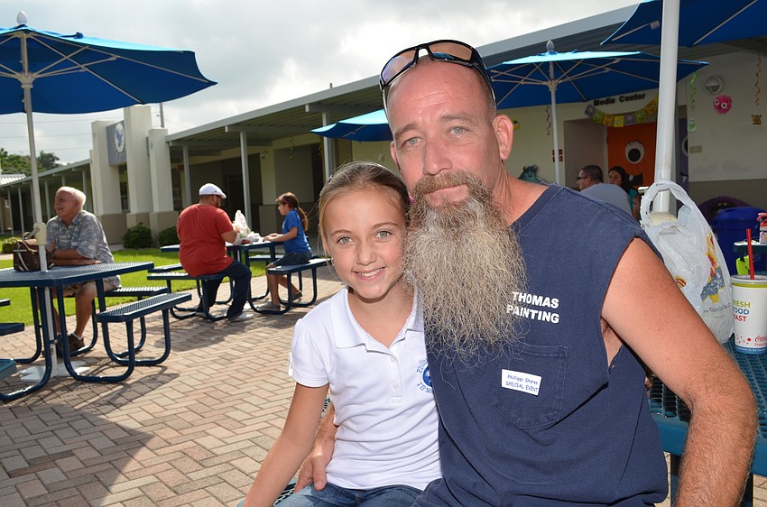 Madison Thomas and her father Mike enjoyed lunch on the courtyard patio.