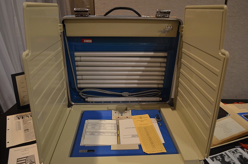 A voting booth used during the 2000 Elections with an unused ballot.